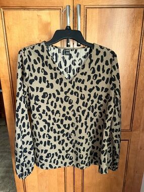 SHEIN Black Leopard Print V-Neck Blouse on Beige
